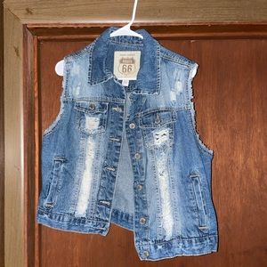 Sleeveless ripped denim jacket from Route 66. Size Extra Large.